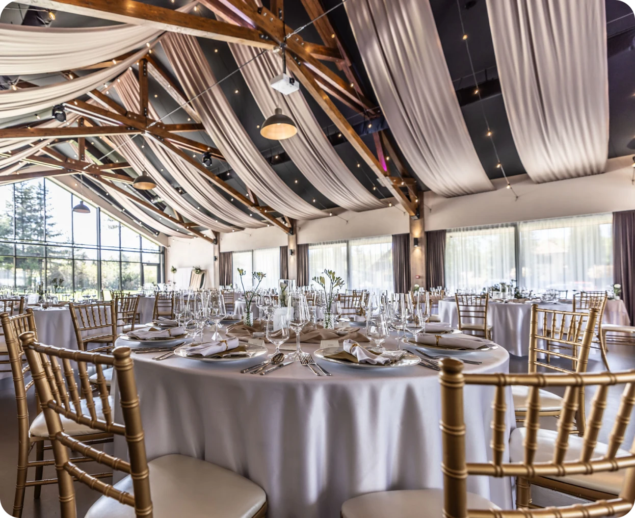 Round tables set for wedding guests